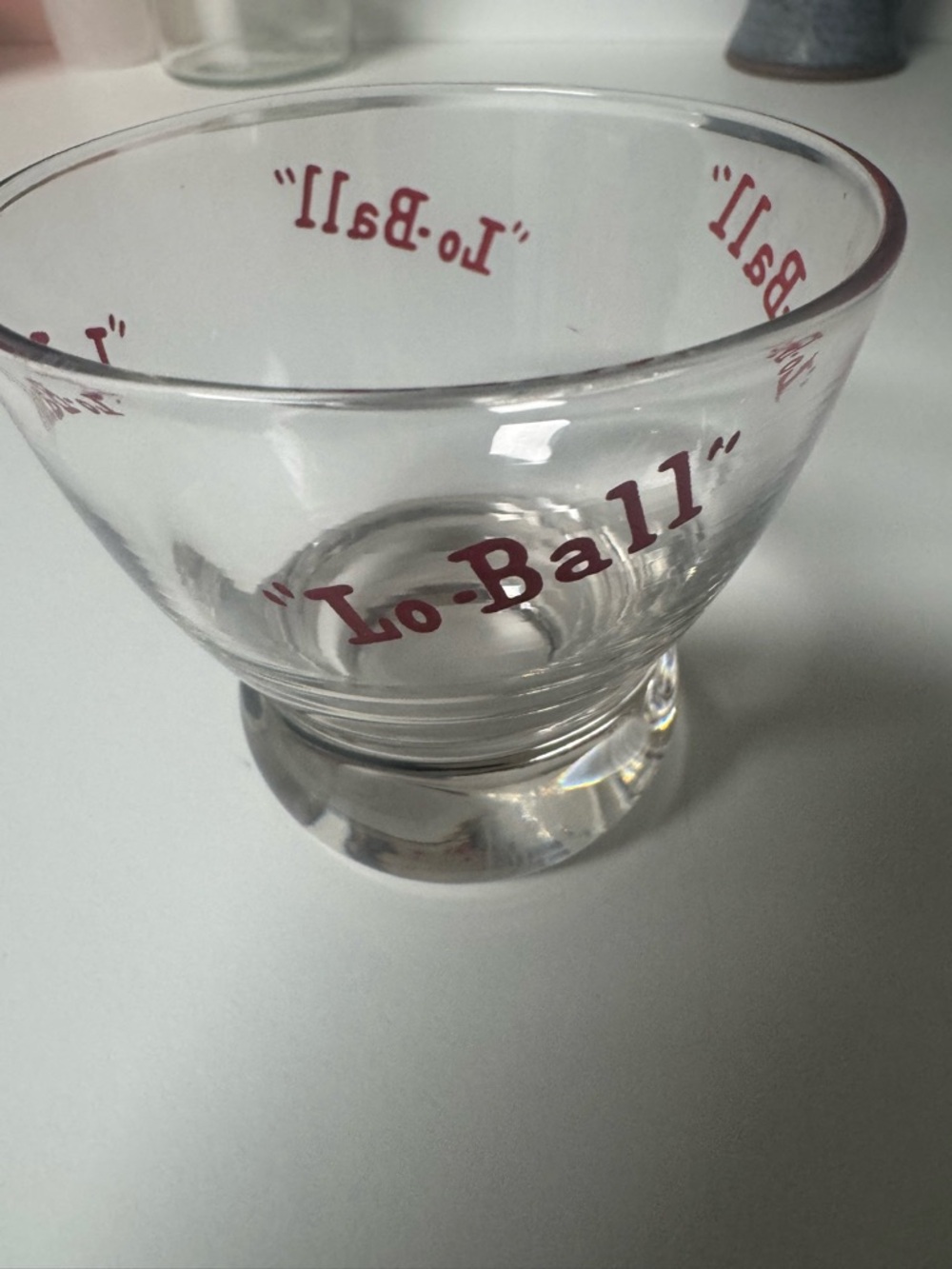 Eva Zeisel Clear Glass 'Lo-Ball' with Red Lettering